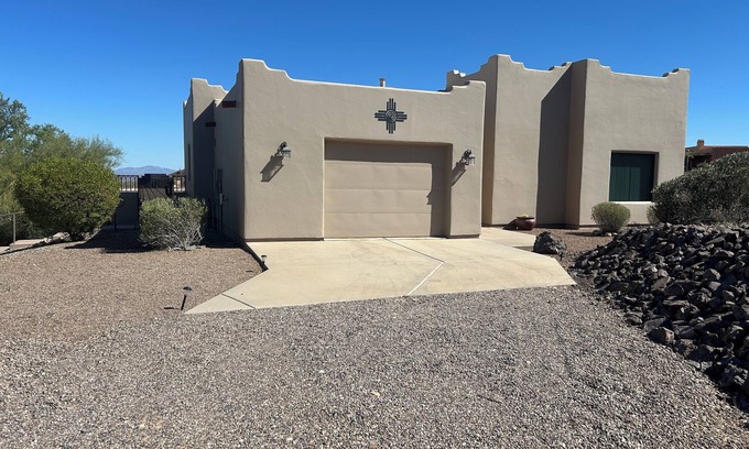 Tucson House | Saguaro Studded City and Mountain Views in the Tucson Mountain foothills.