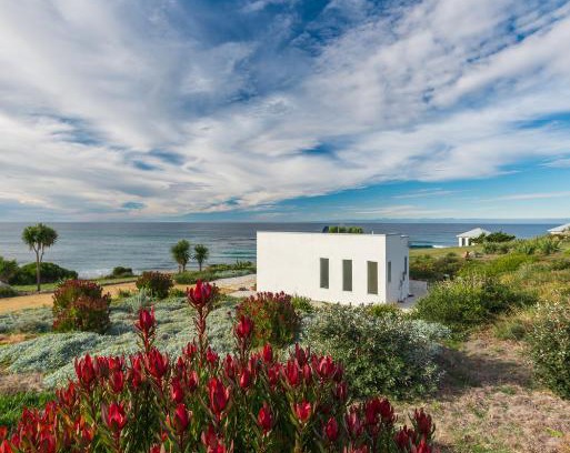 Falmouth Cabin | Saltwater - Absolute Oceanfront, Fire Pits, some Villas with Hot Tubs and Sauna