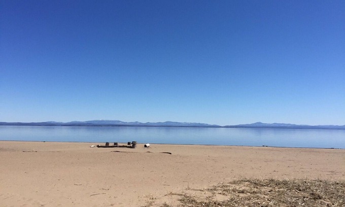 Peru House | Sand beach patio edge to shoreline, spectacular mountain views, beach bonfires!