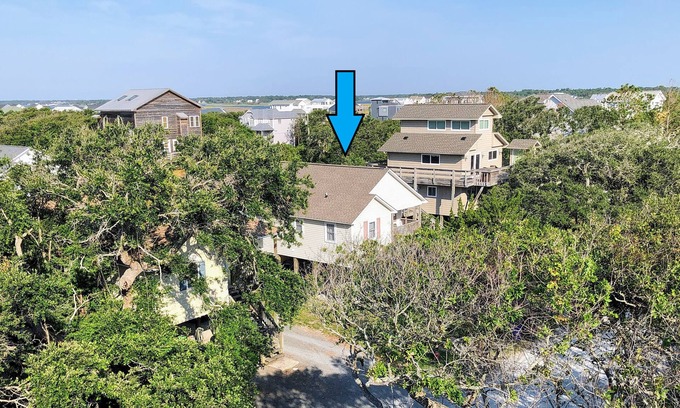 Surf City House | Sandy Crack - A 'side-road' surf cottage. EV-ready.