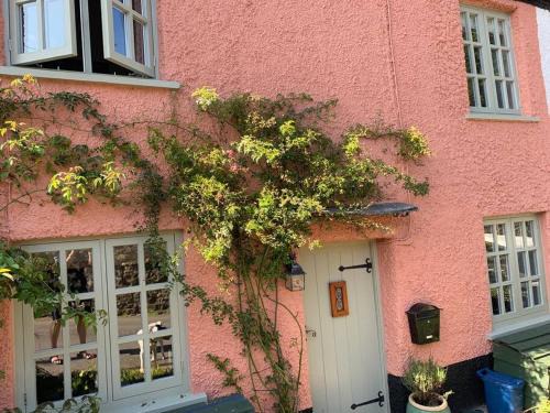 Christchurch House | Sausage Cottage in Oakford Village 4 Bed Garden Local Pub