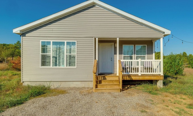 Rapid City Cottage | Scenic Retreat w/Cozy Fire Pit Near Torch Lake