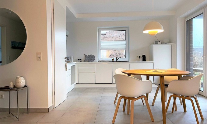 Fedderwardersiel Apartment | Sea and comfort - vacation apartment HEIN with terrace and directly on the North Sea dike!