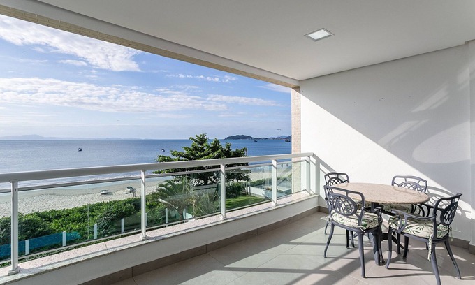 Cachoeira do Bom Jesus Apartment | SEA FRONT | Balcony with Barbecue grill #CHA06