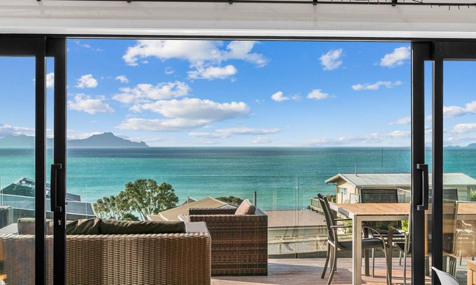 Langs Beach House | Sea Spray - Large modern, sunny holiday home with expansive decks and stunning views over Bream Bay