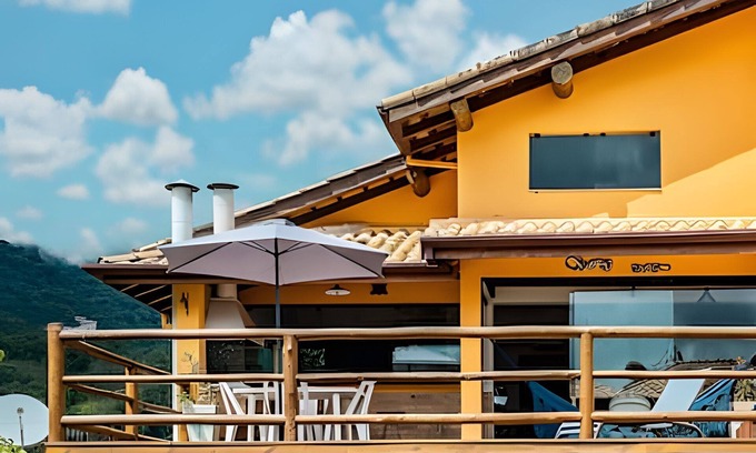 Tesouro da Colina Condo | Sea view and comfort in Ilhabela