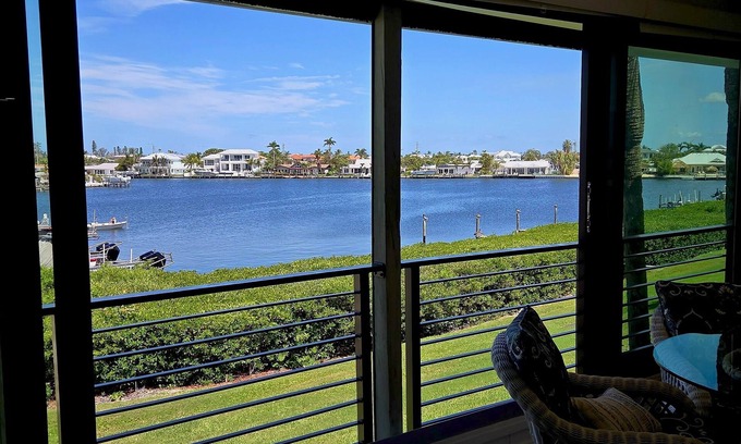 Holmes Beach Condo | Seabreeze Sanctuary: 2BR/2BA Waterfront Condo - Stunning Views & Prime Location