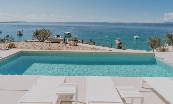 Stara Baska Villa | Seafront Luxury Villa Marim with Beach and Pool
