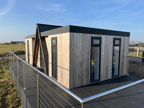 Baleshare Apartment | Seas the Day - self catering lodge North Uist