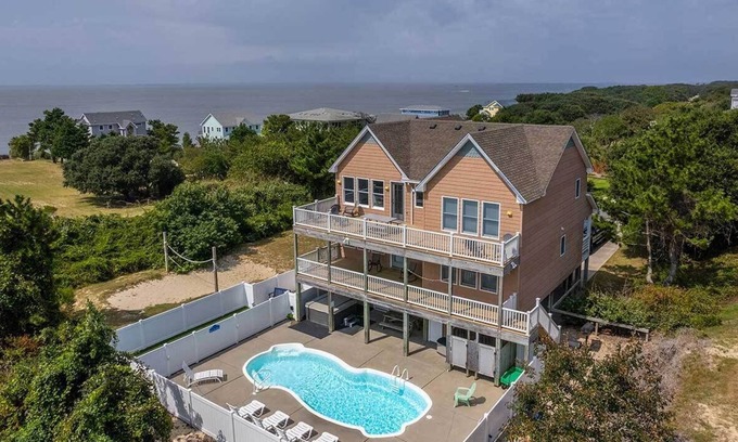 Carolina Dunes House | SEAS THE VIEW Oceanside, close to Duck Village, 7 bed, 4.1 bath, pool, hot tub, dogs allowed!