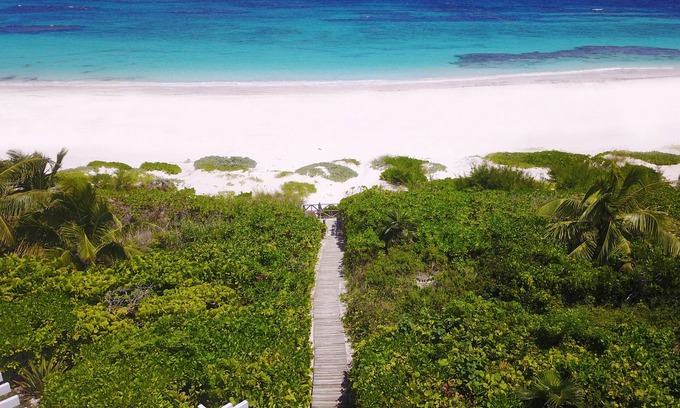 Dunmore Town House | Secluded beachfront property - private beach access, generator, sat. internet