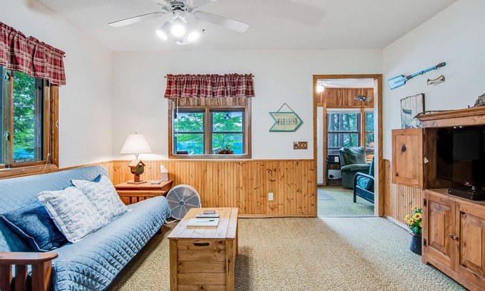 Tomahawk Cabin | Secluded lakefront cabin with private beach, deck, views & firepit- dog-friendly