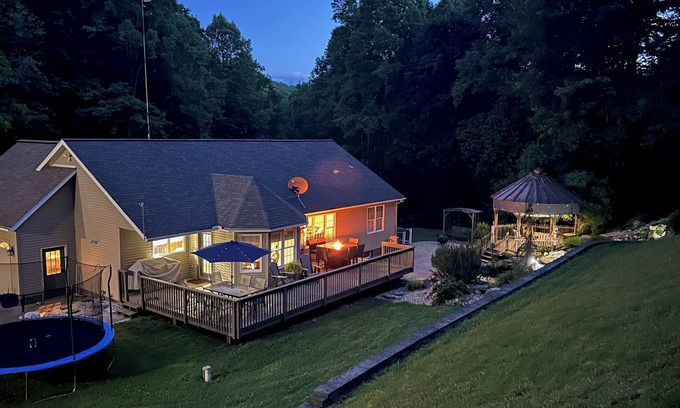 Killbuck House | Secluded peaceful family home! Large deck, patio, waterfalls, koi pond, hot tub!