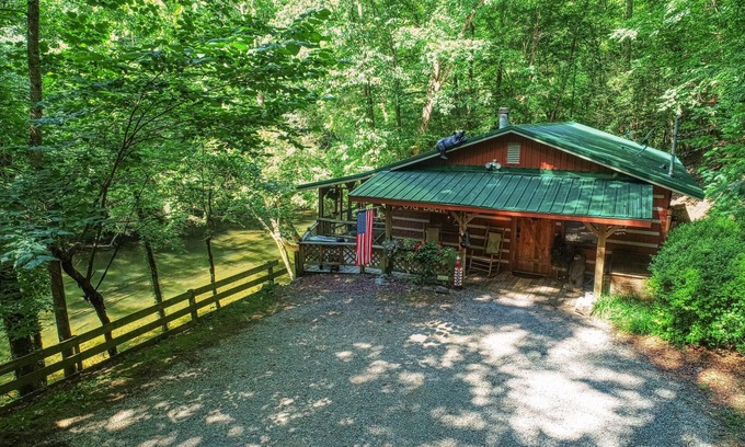Gatlinburg - Pigeon Forge Cabin | Secluded Riverfront Cabin Sounds of the River Screened Porch Gazebo Hot Tub