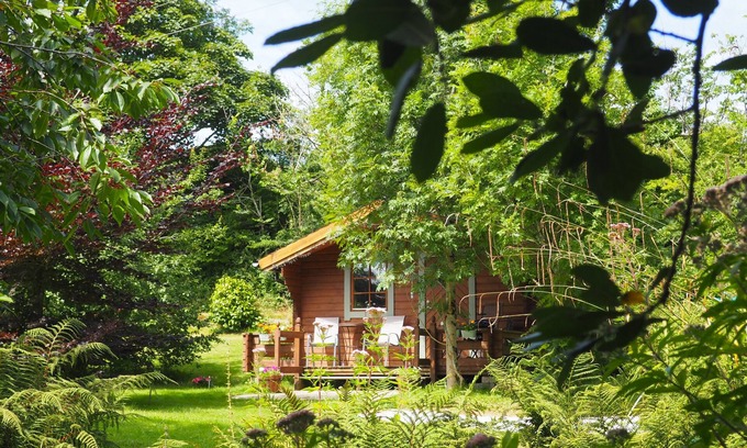 Truro Cottage | Secluded Swedish Lodge in Private Lakeside Gardens