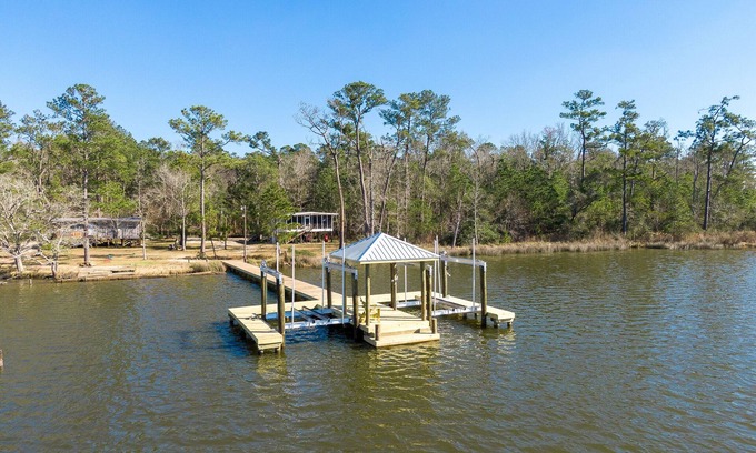 Foley Cabin | Secluded waterfront fishing cabin, boat dock, pier, sunsets, boat to beach