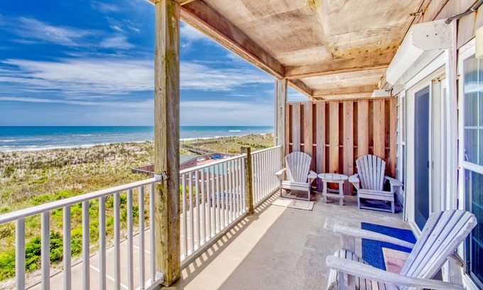 Hatteras Condo | Second-floor oceanfront home with outdoor pool, hot tub, pool table, & W/D
