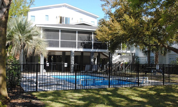 North Litchfield Beach House | Second row home with private swimming pool, screened porch & deck located at North Litchfield Beach.
