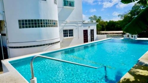 Belize City Apartment | See Belize RELAXING Studio with Sea View Infinity Pool & Overwater Deck