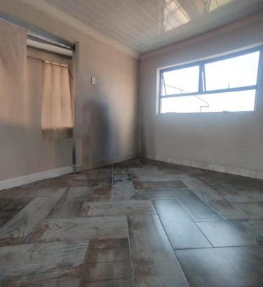 Greater Johannesburg Metropolitan Area Apartment | Self serviced cute and comfy nestled in the heart of lenasia