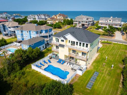 Whalehead Beach House | Semi-Oceanfront Retreat with Pool Theater Elevator