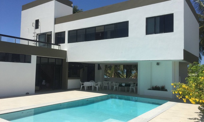 Canto do Mar House | Sensational beachfront home in the best condo in Guarajuba with large pool