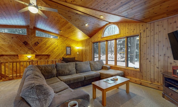 Lake Tomahawk House | Serene Lakefront Home with Fire pit, Dock, WIFI, & Dog-Friendly