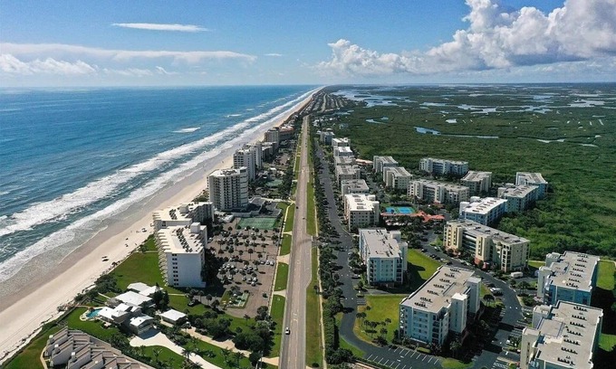 New Smyrna Beach Condo | Serenity Sands: Escape to the seaside resort of Oceanwalk in New Smyrna Beach
