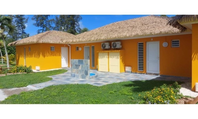 Marie-Galante House | Set in a lush green area, your bungalow is a few steps from a natural beach.