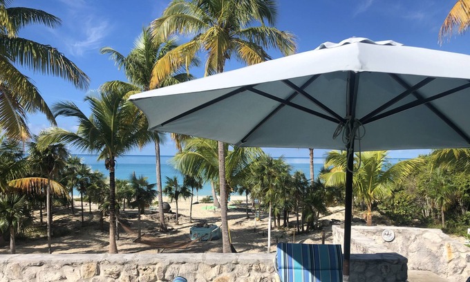 Bennett's Harbour House | Shangri-La- beach front views of crystal-clear blue waters and surreal sunsets.