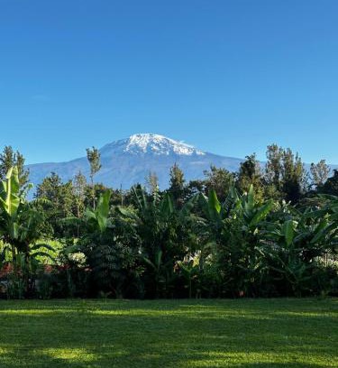 Moshi Hotel | Shose Farmhouse Chalets & Campsite