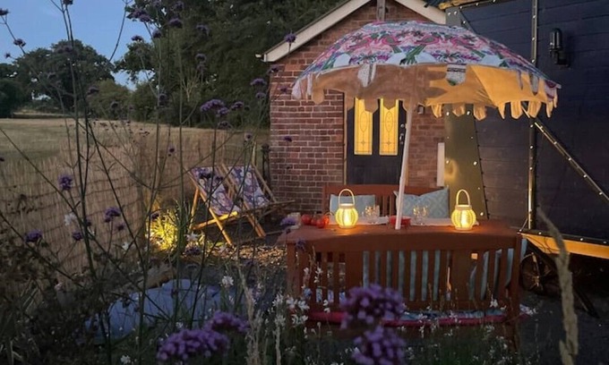 Halfway House House | Shrawardine Station Train Carriage sleeps 4 Fishing and Wild Swimming