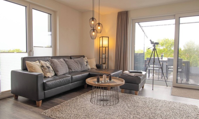 Fedderwardersiel Apartment | Sielhuus 11 Ferienwohnung mit Dachterrasse und Infrarotsauna und Kamin für bis zu 4 Personen in Fedderwardersiel!