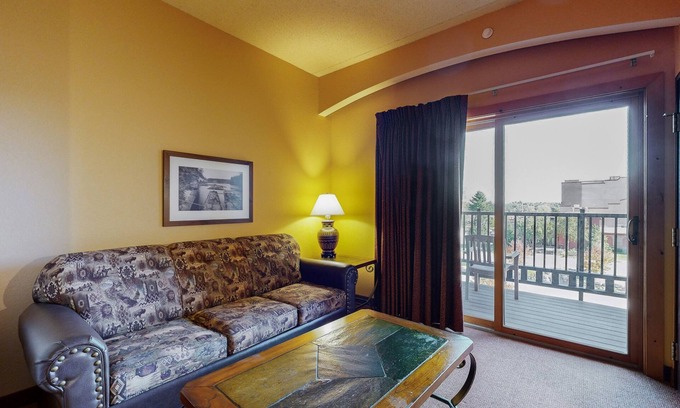 Wisconsin Dells Condo | Side-by-side condos with in-room Jacuzzi, two fireplaces, & full kitchen