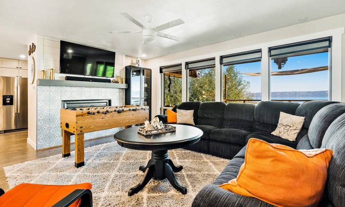 Fish Haven House | Single-level, lakefront getaway with mini-bar, furnished deck & mountain views