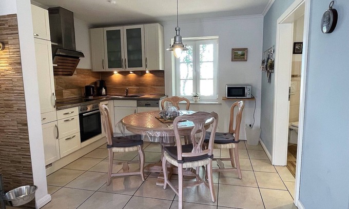 Neudorf House | Single-storey half of the house, dog wellness room, fireplace, fenced, modern, WLAN