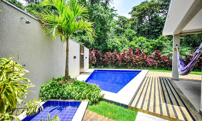 Costa do Sol House | Single storey house with 3 suites with air conditioning, WIFI, Smart TV, swimming pool, barbecue.