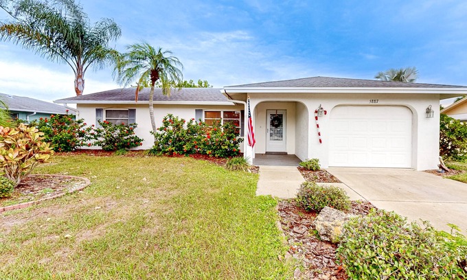 Sarasota Springs House | Single-story home with private yard, enclosed patio, updated interior, & W/D