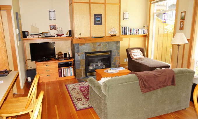 Tofino Condo | Sit and relax in the sun in your yard, or walk 2 minutes to Chesterman beach