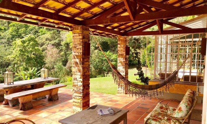 Araras House | Site with natural water pool and waterfalls