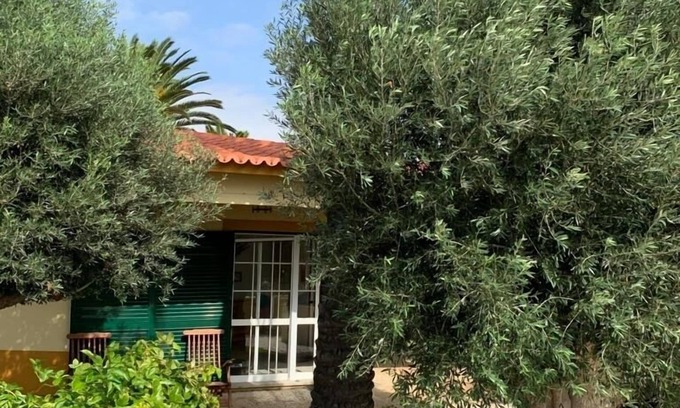 Campo de Baixo House | Situada dentro de um condomínio fechado de luxo, com a praia a 3 minutos a pé