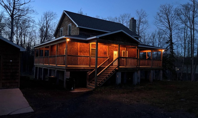 Trowbridge Park House | Six bedroom home with a hot tub, pool and an outdoor bar on a two acre lot.