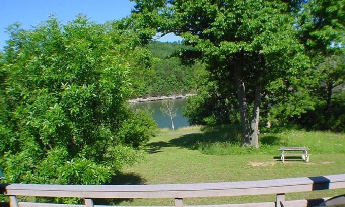 Holiday Island Condo | Six-Person Hot Tub, Lakeside, King Beds, Fireplace!