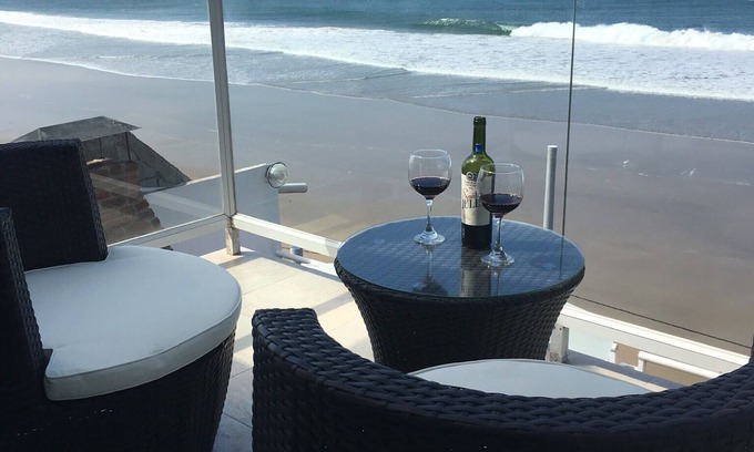 Montanita Condo | Sky Vista Suite is directly on the beach in town!
