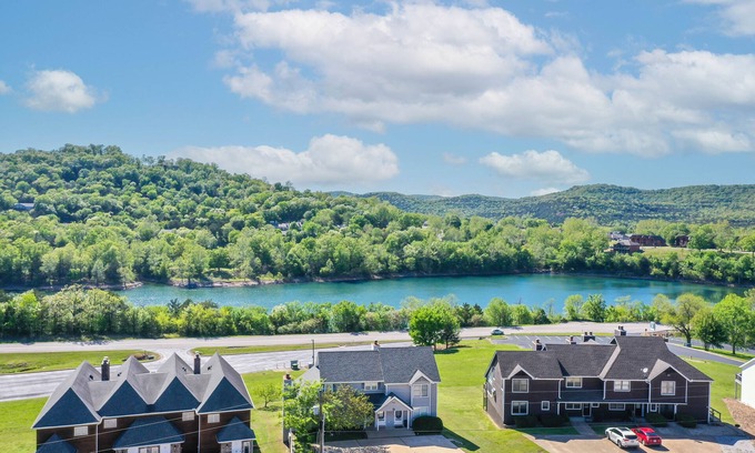Holiday Island Condo | Sleep 11 comfortably, summer calendar booking fast! Walk to lake & marina!