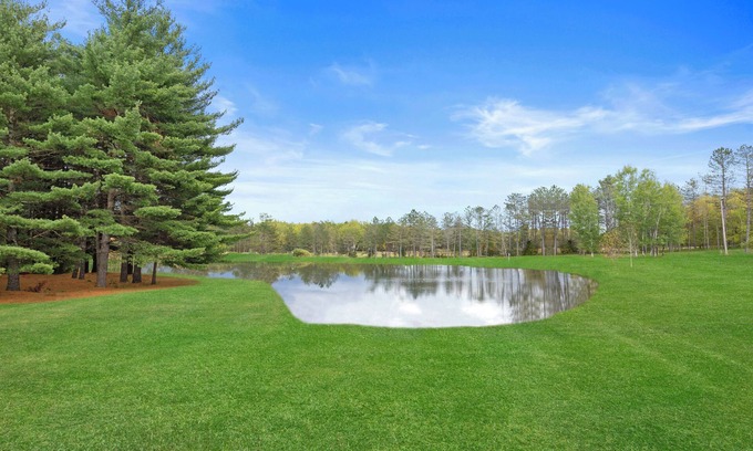 Manton Cabin | Sleeps 40- 12 Bedroom/12 Bath Lodge on 80 acres with 26' x 52' Great Room