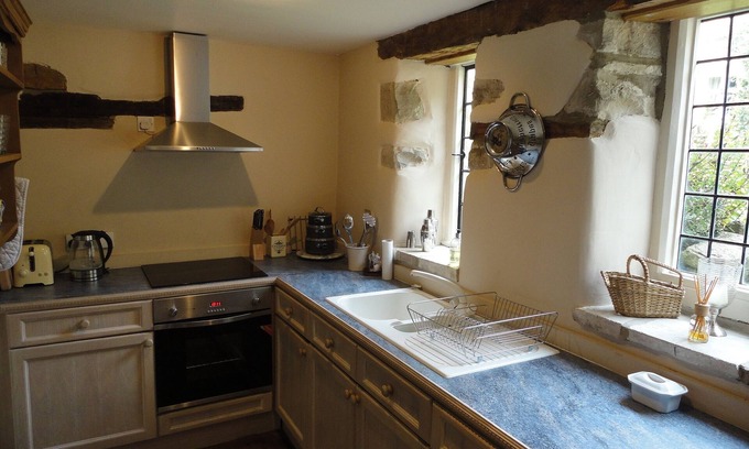 Duntisbourne Abbots House | Small converted barn in peaceful village setting.