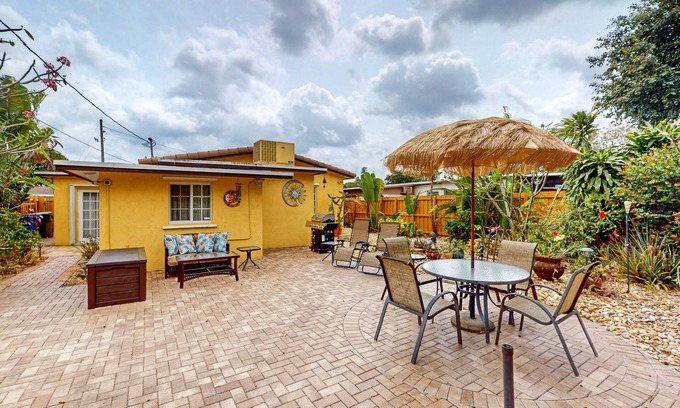 South Middle River House | Snowbird-friendly home with enclosed backyard, grill, patio, streaming, W/D, AC