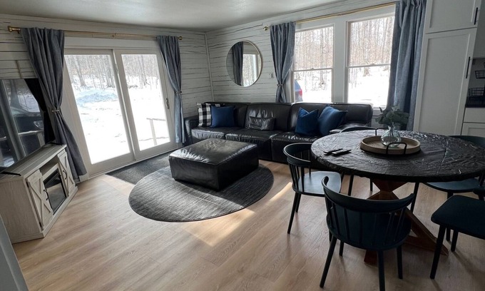 Petoskey House | SNOWMOBILERS PARADISE! Trail access from front door! Up North Quiet Getaway!