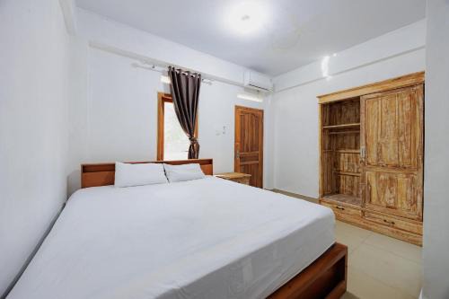Penatih Hotel | Soka Asri Guest House near Bali Zoo RedPartner